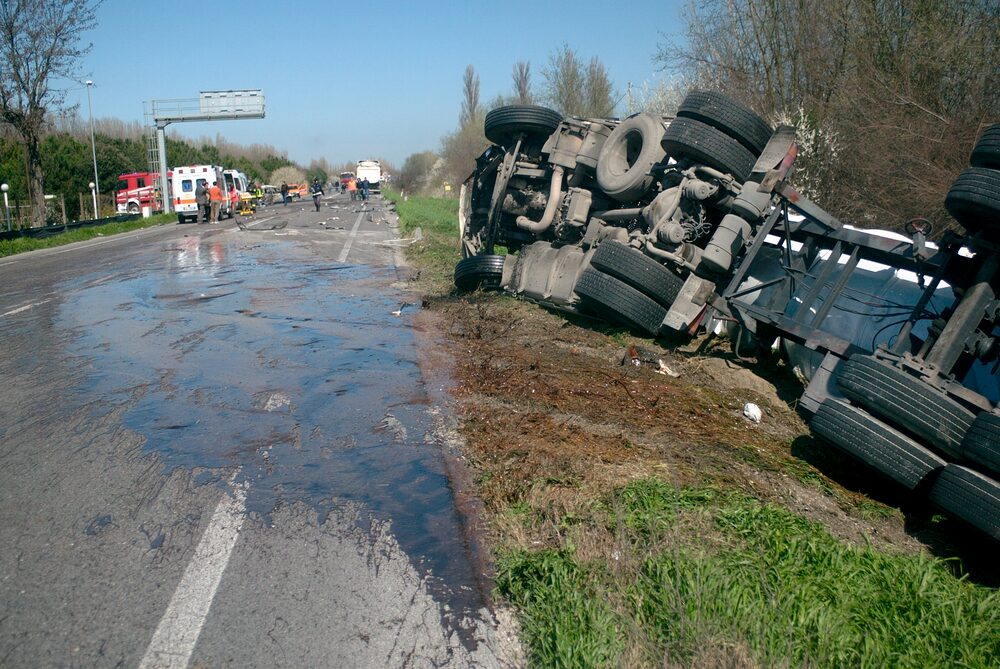 flipped 18 wheeler truck on the side of Texas highways