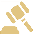 A tan gavel resting on its block, symbolizing law and justice.